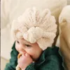 Härlig varm bowknot pannband vinter baby beanie hatt fast färg spädbarn beanies huvud wraps söt mjuk fleece tjock barn turban baby pannband