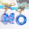 Keychains Fashion Heart Fyllt Harts Letter Keychain Tassel Kvinnor Handv￤ska Charm Blue Fj￤ril