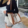 Sac fourre-tout usine vente en gros et au détail étudiant toile sac femme été 2023 nouvelle mode lettre une épaule grande capacité tissé