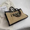 Tote Bag Fabbrica all'ingrosso e al dettaglio Wtern Style Paglia tessuta donne di grande capacità 2023 Nuova borsa di moda Summer Texture Commuter Shoulder