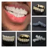 Lodowe sześcienne z cyrkonu grille dentystyczne biżuteria 18k prawdziwy złoty punkowy hip hop Jezus Fang Grillz Brace Full Diamond Vampire Toot Tooth Capplay Party Prezenty Raper 7384