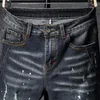 Heren jeans verfspray gescheurde gat patch voor heren mager slanke fit blauw gerafeld streetwear hiphop denim broek patchwork heren broek