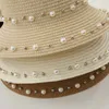 Berets printemps et d'été femelle Suncreen Sun Hat Children Bowknot Straw Pearl Beach Traw Parent-Child