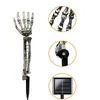 Corde 1Pair Skeleton Hand Solar Light Outdoor Impermeabile Illuminato Arms Stakes Skull Decorazione di Halloween Lampada da giardino da giardino