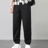 Pantalons pour hommes Mode solide Mode Casual Jogger Poches boutonnées Pantalon de survêtement mâle Style coréen