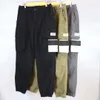 Pantaloni cargo da uomo Pantaloni in cotone con tasche applicate su entrambi i lati e cerniere posteriori per capispalla sportivi da corsa primavera autunno inverno