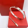 Urocza projektantka tenisowa Women039s Bransoletka klasyczny śrubokrętny Bangle Boys Girls Valentine039s Dzień Boże Narodzenie prezent 15407348