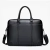 Портфели мужской портфель PU кожа большая мощность 14 -дюймовая сумочка для ноутбука мужчина мода повседневная сумка для плеча на плече