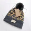 Australia Diseñador Sombreros de punto Invierno Pompon Gorros Imitación Marta Pelo Piel Pom Skull Caps Bonnet Chunky Crochet Hat Al aire libre Gorro cálido Ear Muff INS
