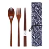 Flatvaruuppsättningar Portabelt trämbestick Set trägerobesöken Knivar Forker Spoons Chopsticks Travel Cogervis kostym Miljö med väskan gåva