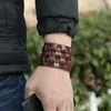Sticka motorcykelbrett korsläder Bangle Cuff Multilayer Wrap -knapp Justerbar armband Wristand för män Kvinnor Fashion Jewelry