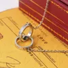 Collier de mode designer bijoux fête chaîne en or titane acier double anneaux diamant pendentif colliers femmes longue chaîne bijoux cadeau de Noël avec boîte