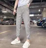 Pantaloni da uomo Estate Gioventù da uomo Casual Lace Up Fashion All-Fiammifero Blackhin Sezione Allentata Nona S Tuta Y2k Abbigliamento Streetwear