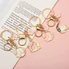 Keychains Creative small fresh cherry blossom metal key pendant cute cartoon animal alloy decorative accessories