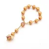 ベビーブレスレットジュエリージュエリーエンジェルバプテスマはカラフルな真珠を支持します。
