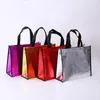 F￶rvaringsp￥sar 1pc tote ￥teranv￤ndbar livsmedelsv￤ska icke-v￤vt shopping laser tyg vikbar handv￤ska stor kapacitet