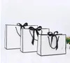 Grand sac en papier kraft blanc à bordure noire, avec poignée, cadeau avec nœud papillon pour fête de mariage, GCB16005