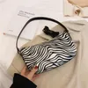 Avondtassen zebra patroon pu lederen okselzak voor vrouwen 2022 kleine ketting schouderhandtassen vrouwelijke reis trending designer hand