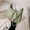 2022 neue Frauen Leder Schulter Tasche Mode Einfache Textur Ausländischen Stil hand Stick Tasche Achselhöhle Weibliche Luxus Tote Tasche