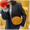 Designer väskor 2024 New de Pig Nose Bag Mini Round Cake Single Shoulder Msenger Konkav Form Womens Factory Direct Sale Purses Ladies Handbags Rabatt