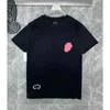 T-Shirt Erkekler Yaz Erkek Lüks T Shirt Marka Chan Com Horseshoe Flower Tees Klasik Çapraz Sanskrit Mektubu Kısa Kollu Tasarımcı Tshirts Kadınlar Top Gn23