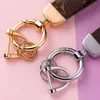 Moda M65221 Dragonne Key Titular Designer Floral Canvas Keychain Chain Chain Accessoires 9 Colors