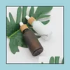 Packing Bottles Frosted Amber White Glass Dropper Bottle 15Ml 30Ml 50Ml With Bamboo Cap 1Oz Wooden Essential Oil Bottles Drop Deliver Dhvjt