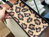 Kvällspåsar totes tygväskor kvinnor handväska duk axel rem leopard panel läder designer crossbody shopping hink inuti med liten handväska 220309