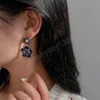 Orecchini pendenti con fiore di zirconi cubici Eleganti orecchini con piercing ad ago in argento 925 rosa blu scuro Accessori di moda per ragazza