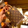 Роскошные дизайнеры сцепления на плечах сумки сумки сумки для перекрестного купюра кошельки с буквами цветочные цветочные ручки для кошелька модные бренды сумочка кошелек