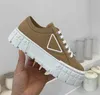 Women Shoes Sneakers. Fashion Rubber Platform Nylon Gabardine Inspired By Motocross Tires Defines Design Of These The Triangle Decora