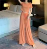 Suisses à parcours pour femmes Sexy ouverte nombril à manches courtes couleurs solides T-shirt Femme Femme Élastique Sangle de taille haute