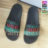 Med låda Tofflor rutschkanor sandaler designer män kvinnor lyx rutschkana strand utomhus sommar trendigt läder gummi mode sandal platt casual herr damskor tofflor