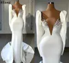 Abiti da sposa a sirena con scollo a V sexy scollo a V Splendide perle maniche lunghe Dubai Abiti da sposa arabi con strascico Vintage Boho Elegant Satin Robes de Mariee CL1230