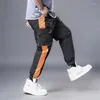 Pantaloni da uomo Pantaloni arancioni con patchwork laterali Pantaloni cargo da uomo Moda Pantaloni larghi 7XL Pantaloni sportivi taglie forti Pantaloni maschili HA020