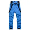 Pantalon de Ski 2022 hommes femmes Ski hiver vêtements de sport de plein air coupe-vent imperméable chaud neige pantalon Snowboard bavoirs Couples