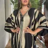Printemps et automne à manches de chauve-souris rayée Mode musulmane robe arabe Tassel New Women's Party Robe BT166