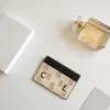 Mujeres para hombre CL Carteras Titular de la tarjeta Monederos Luxurys Designer Hollow Out Wallet Moda Cuero con caja Porte Carte Smooth She304C