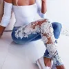 Kvinnors jeans spets blommig virkning ih￥lig h￶stkvinnor elegant sexig denim blyerts skinny 221007