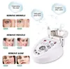 Équipement de salon 5In1 Diamond Peeling Dermabrasion Épurateur de peau Microcourant Machine de levage de visage Pulvérisation d'eau Dissolvant de points noirs