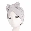 Cappello turbante musulmano con fiocco in tinta unita Berretto interno Hijab Berretto elastico Cappello Donna indiana Copricapo avvolgente per africano