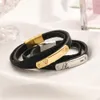 Bijoux de créateurs Femmes Bracelets en cuir Bracelet de charme de motif de fleur avec quincaillerie en argent doré pour hommes bruns brun logo tampon de mode imprimé