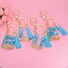 26 Initialer Letter Keys Keychains Pendant With Green Fluffy Pompom Fashion Keyring Women Handbag Glitter Gradient Harts Alfabet Keychain Charms