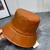 Sombreros de ala ancha Cubo Cubo de cuero para hombre Diseñador de mujer Fisher Hat Moda Boater Cap Hombre Invierno Marrón Sombreros para el sol Equipado Fedora Unisex