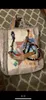 Totes Lady Shopping Canvas Graffiti Imprimé corde de sac à main imprimé brodé avec un sac à bagages en toile à imprimé multicolore Sac Postman 244k