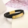 Designer smycken bredbrun läderarmband män charm armband med guldmaskinvara för kvinnor handband brun blommönster logotyp stämpel tryckt mode gåva