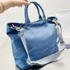 Bolsa de compras de lona Bolsas casuais de grande capacidade Bolsa de ombro Bolsa triangular de folha de metal com zíper Carteira removível com alça de ombros largos