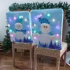 Chaves de cadeira Decoração de Natal Capas traseira protetor de assento de assento com capa com o velho boneco de neve, padrões de jantar decoração da sala de jantar