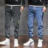 سراويل الرجال جينز جينز العلامة التجارية للأزياء متعددة الاستخدامات عمل مرنة فضفاضة ملابس أرجل هارلان 2022 الخريف والشتاء عارضة
