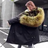 La fourrure féminine 2022 Real Parka Veste d'hiver enrober les femmes Long Ratcoon Hood Cagoule épaisse chaude détachable imperméable